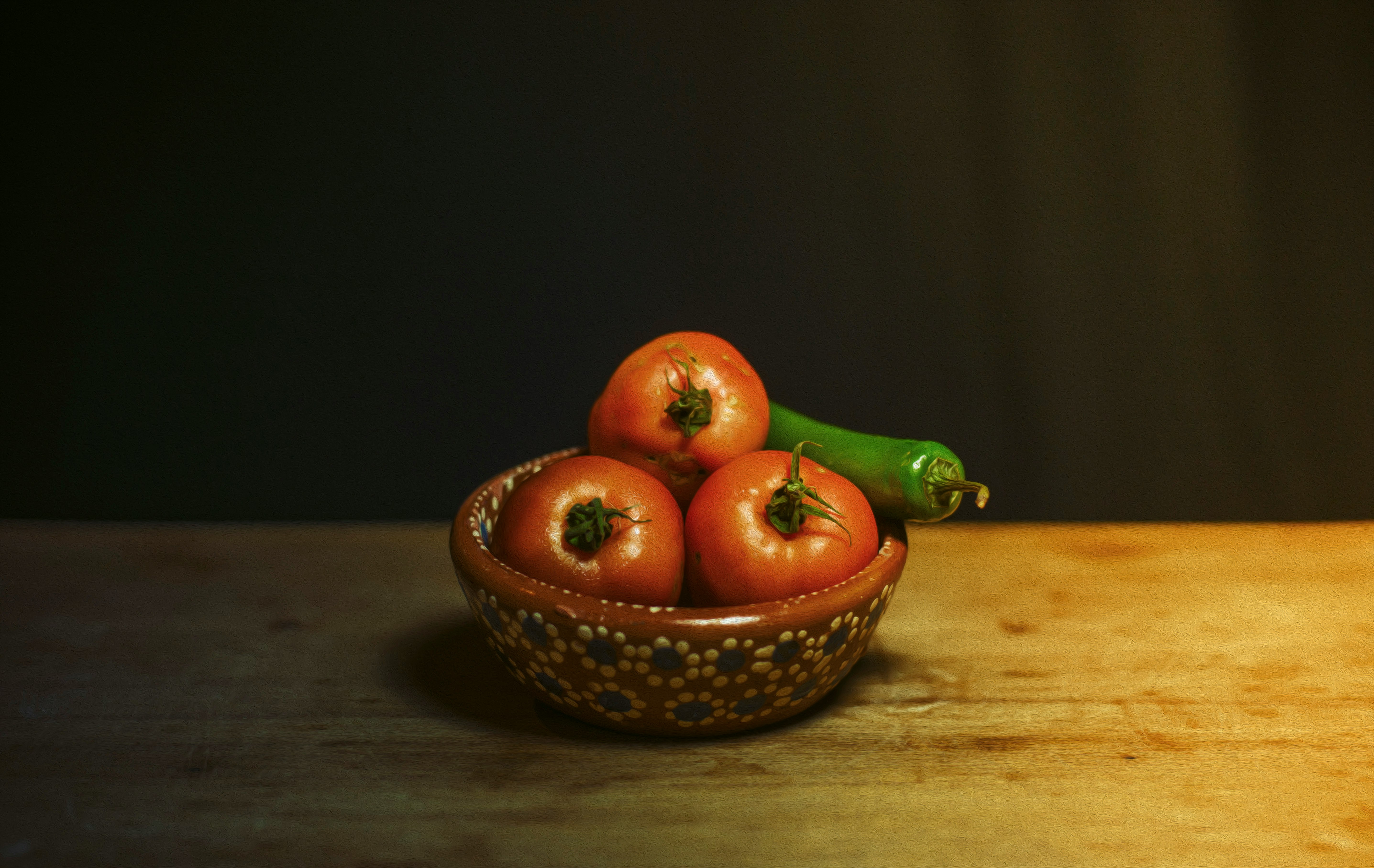 orange fruit on brown woven basket